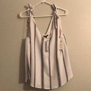 Pink Clover Black and White tank top.